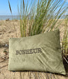 Coussin en velours côtelé