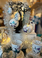 Boule de Noël ovale en porcelaine, motif "Les lutins du Père Noël"