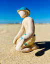Sculpture en céramique "Baigneur à genoux sur le sable"